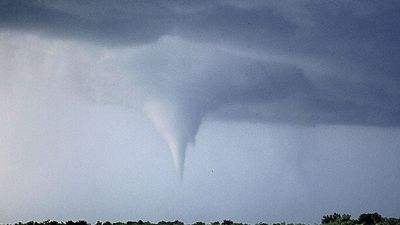 Kansas tornado over field. (twister, strom, weather, clouds)