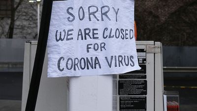 A sign at a gas station alerts customers that a business in Queens, which has one of the highest infection rates of coronavirus in the nation, is closed on April 3, 2020 in New York City. (covid-19, pandemic)